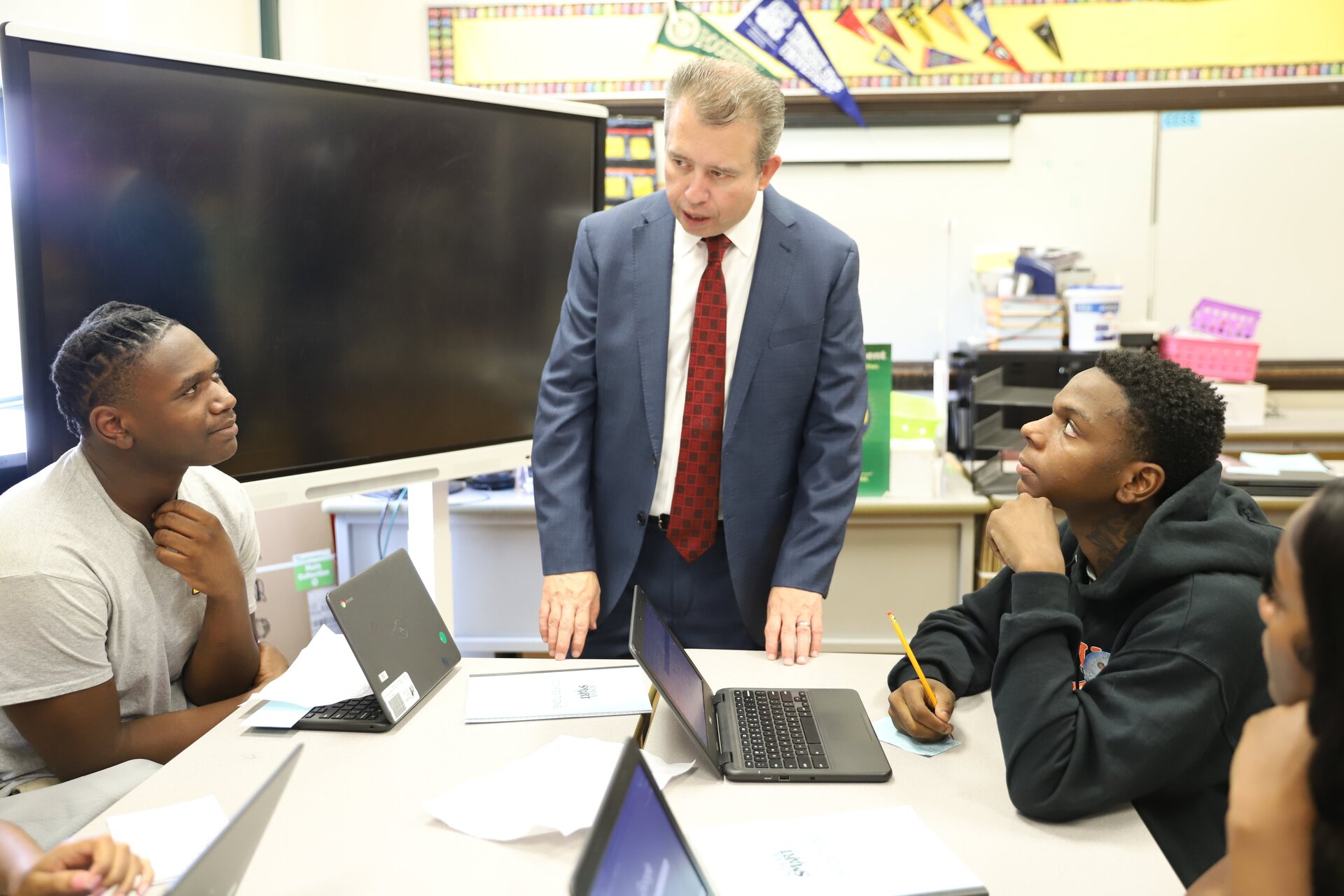 CEO with students