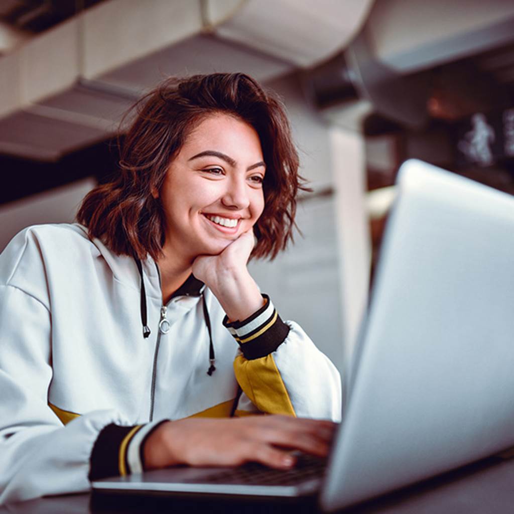 A girl using a laptop