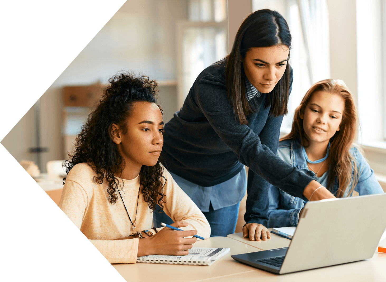 image of students at laptop