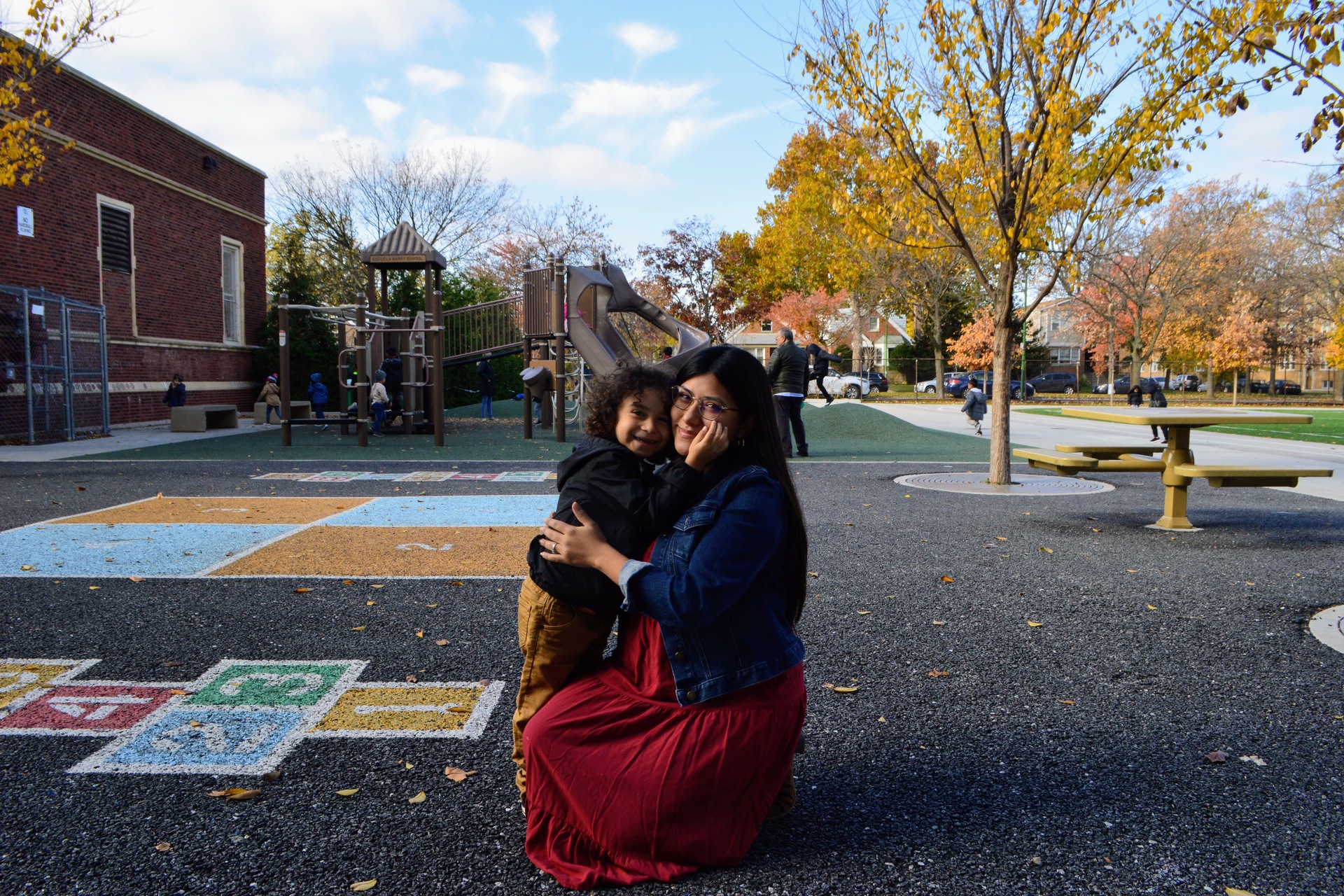 parent and student in schoolyard