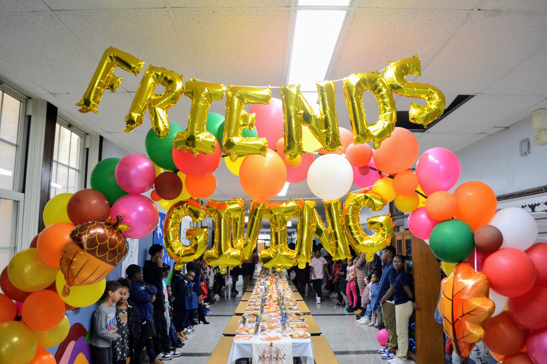 friends giving balloons 