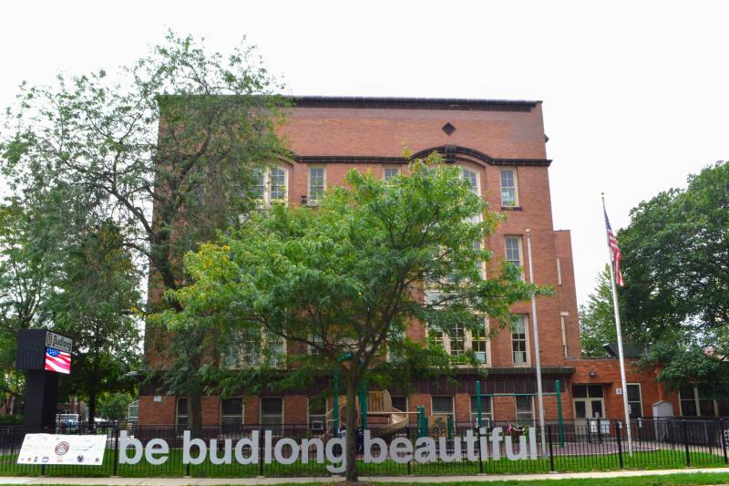 a building with a tree in front of it