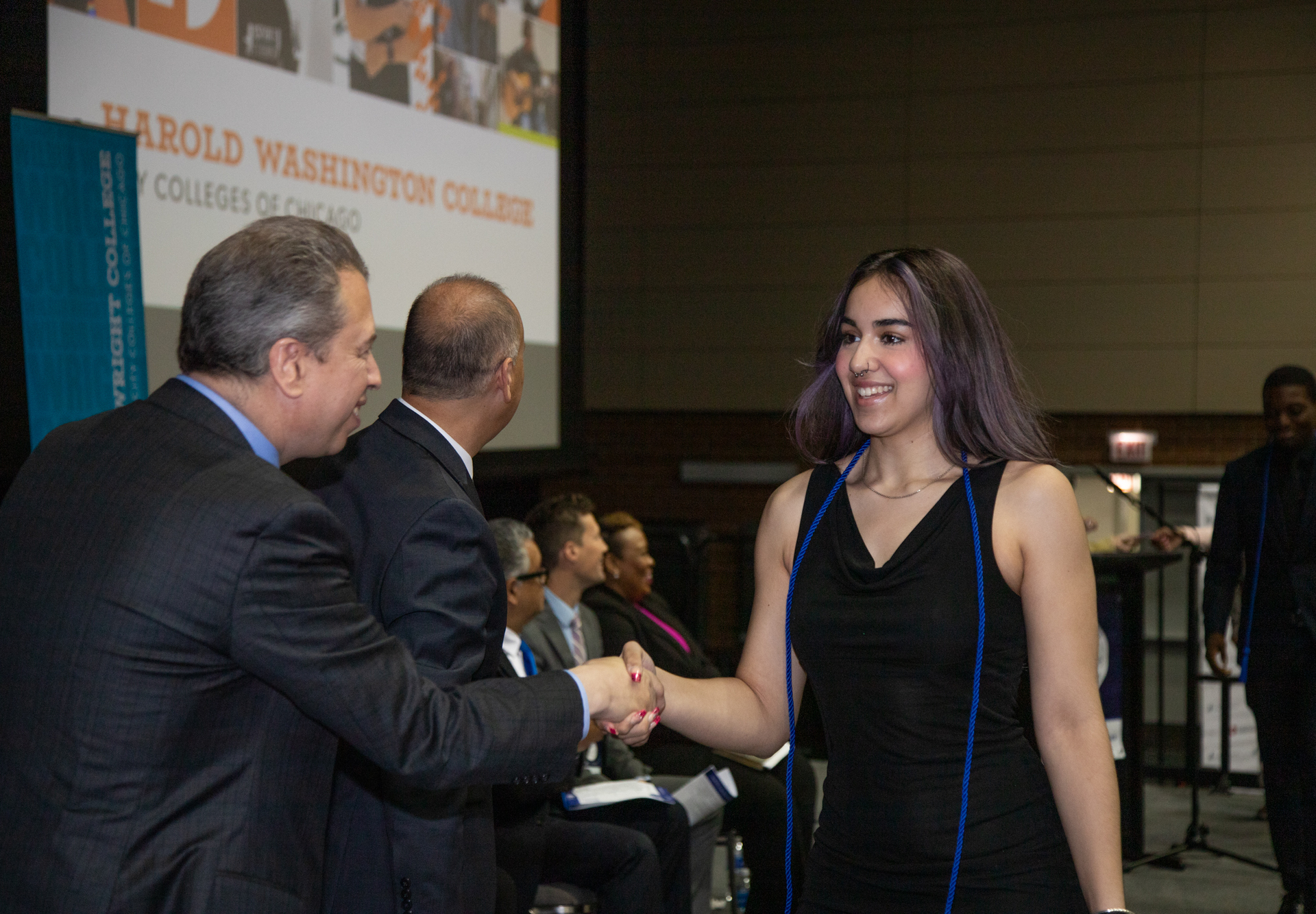 CEO Congratulating student