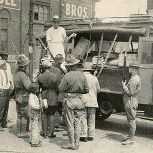 The Early History of Segregation in Chicago - Image of people at newspaper stand