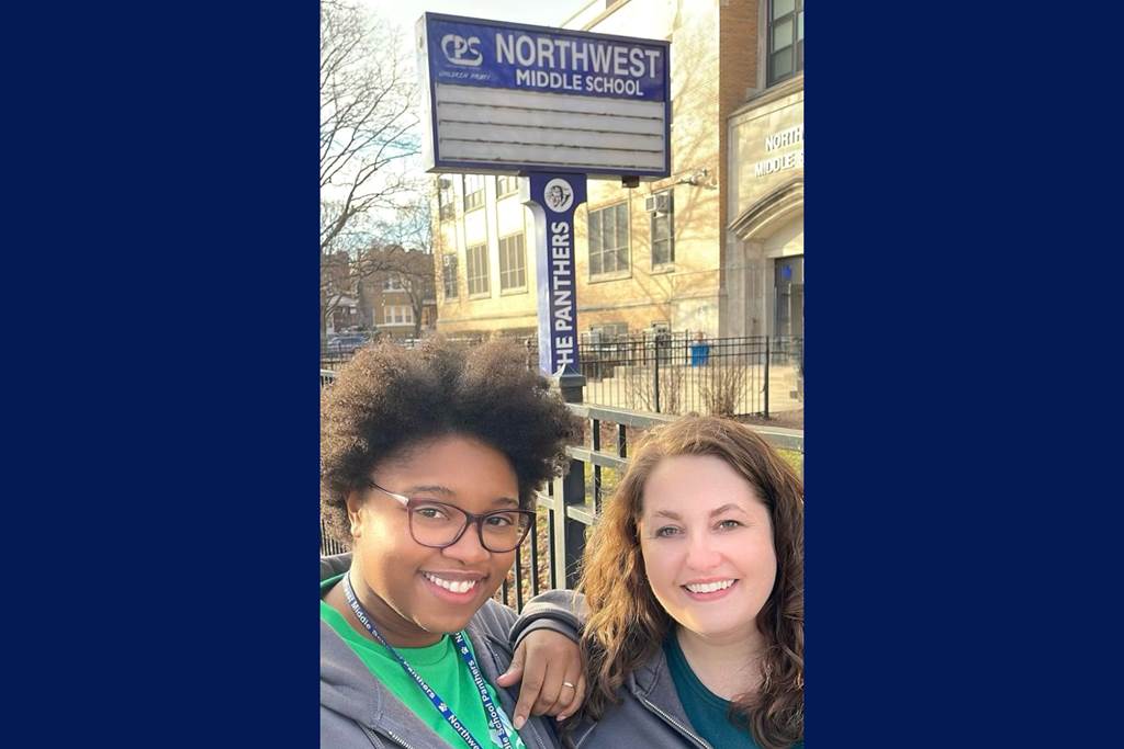Ms. Martin and Ms. Manasse smiling outside of Northwest Middle School