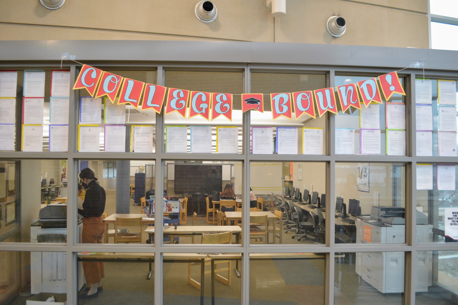 A "College Bound" sign in front of a classroom