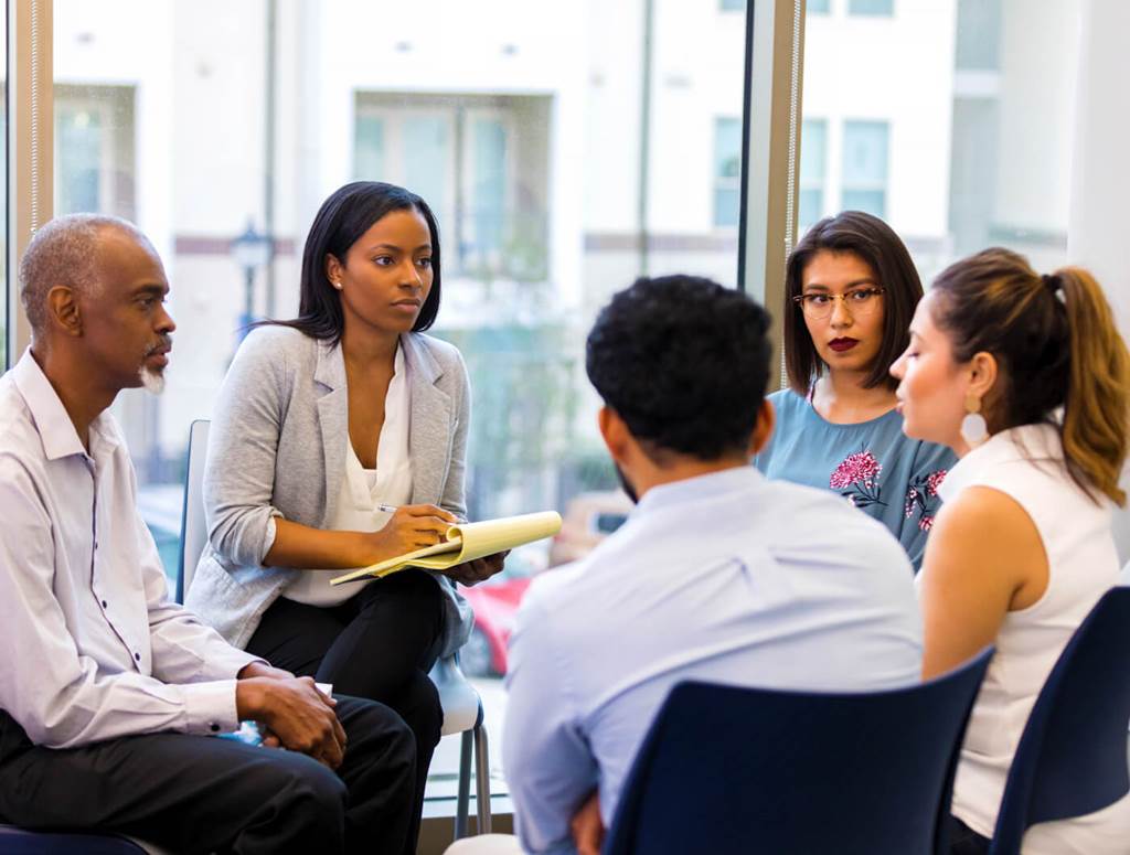 people sitting at a meeting