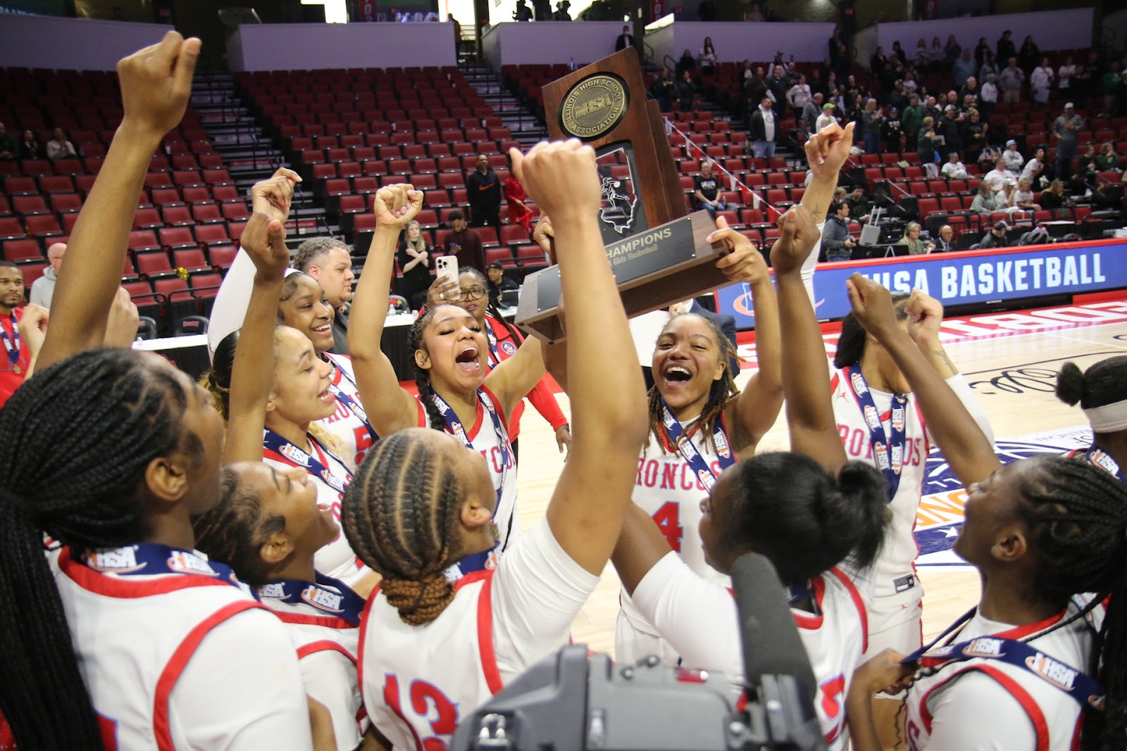 Kenwood Academy Broncos celebrating