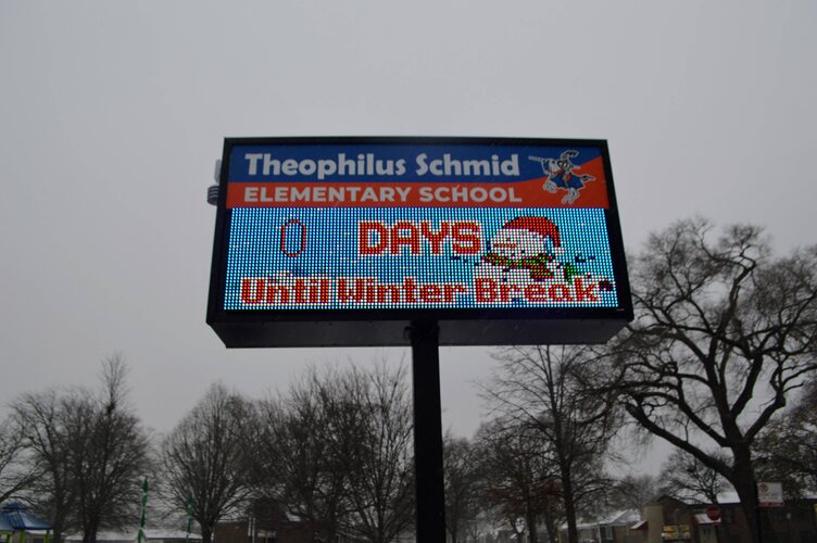 Schmid winter break sign