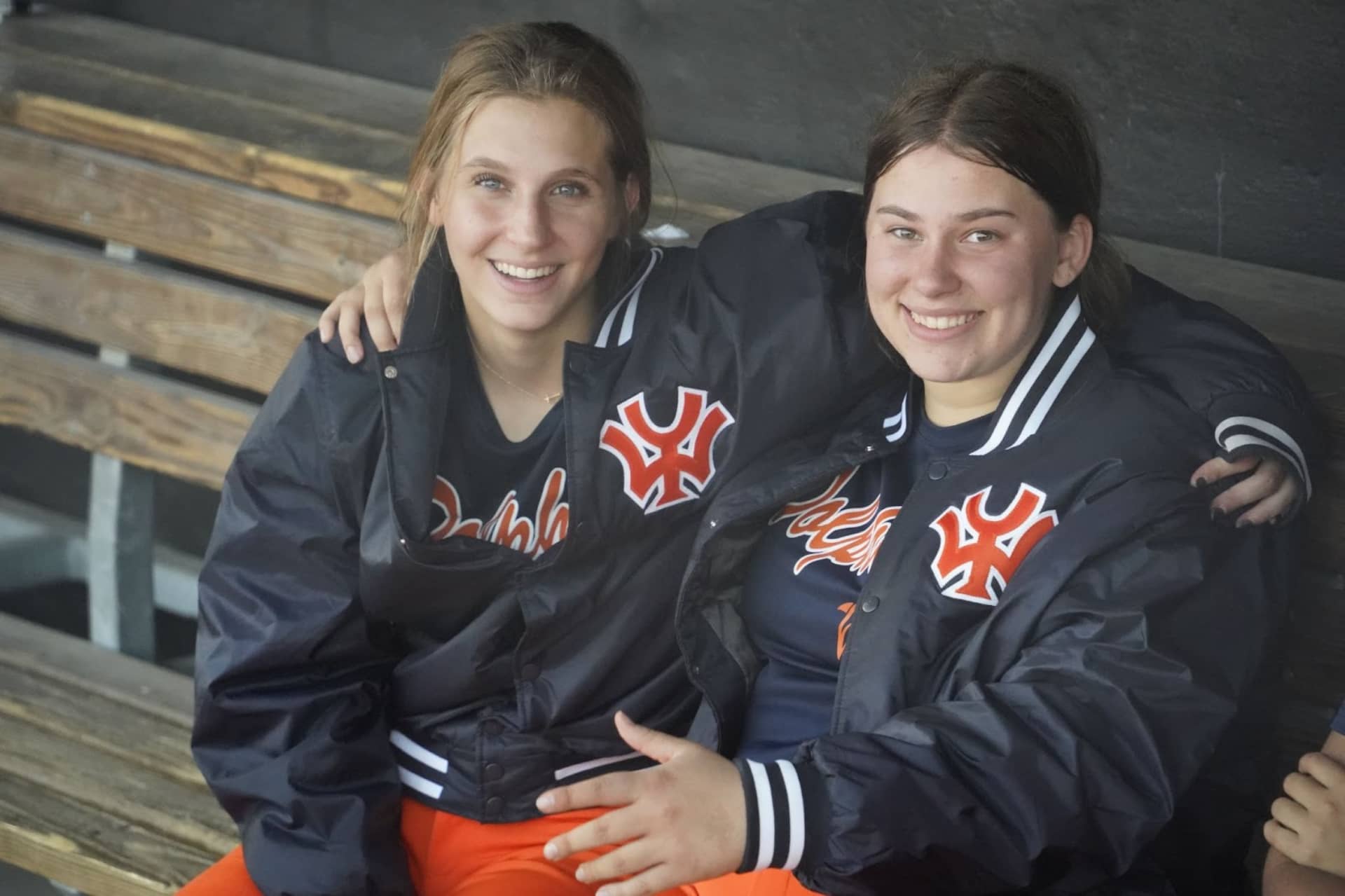 image of two players in the dugout