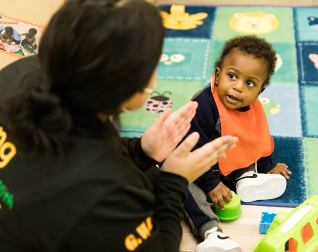 Infant learning through play with teacher