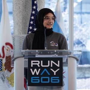 Fatima speaking at the Runway 606 event