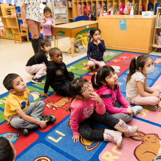 Preschool students sitting together 