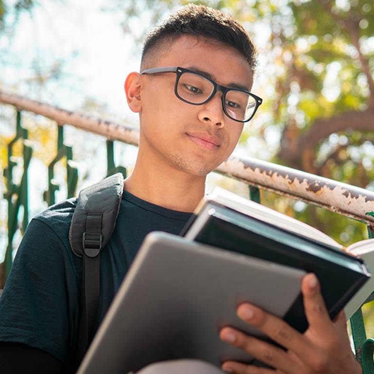 A student reads a book