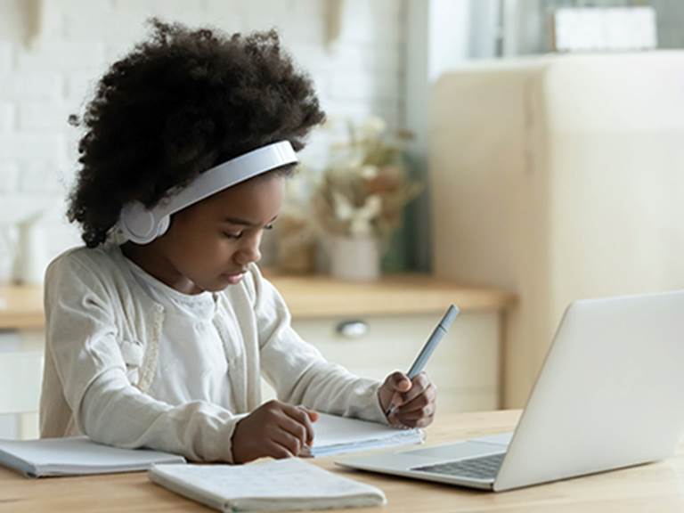 Girl studying at computer