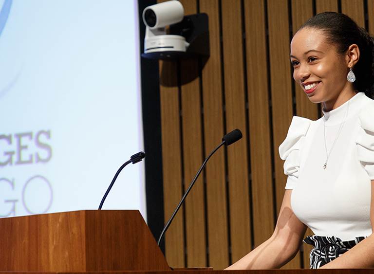 A student stands at a podium