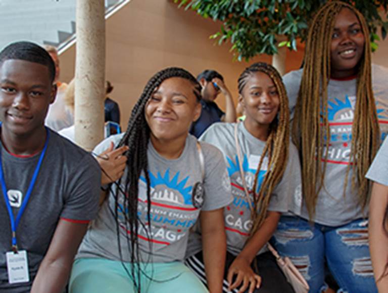 Four students sitting together