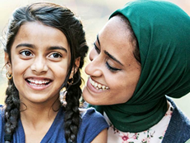 Mother and child smiling