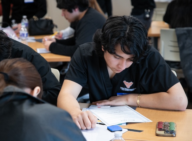 A student participates in an academic competition