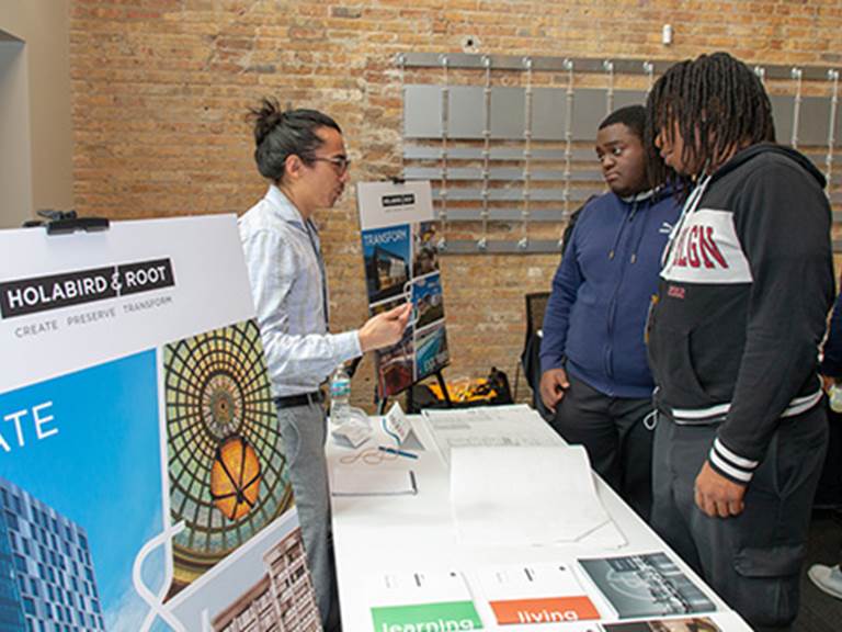 Students talking to a promoter