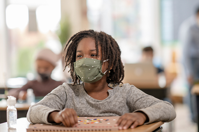 image of student with mask