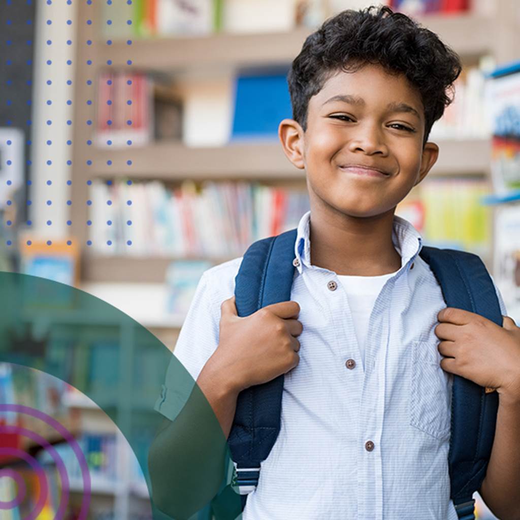 image of smiling student wearing backpack