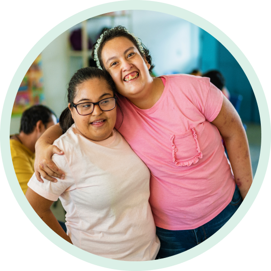 Two students smiling