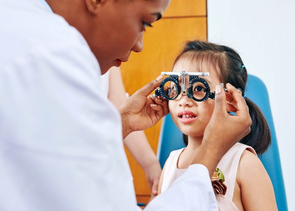 image of young girl at eye exam