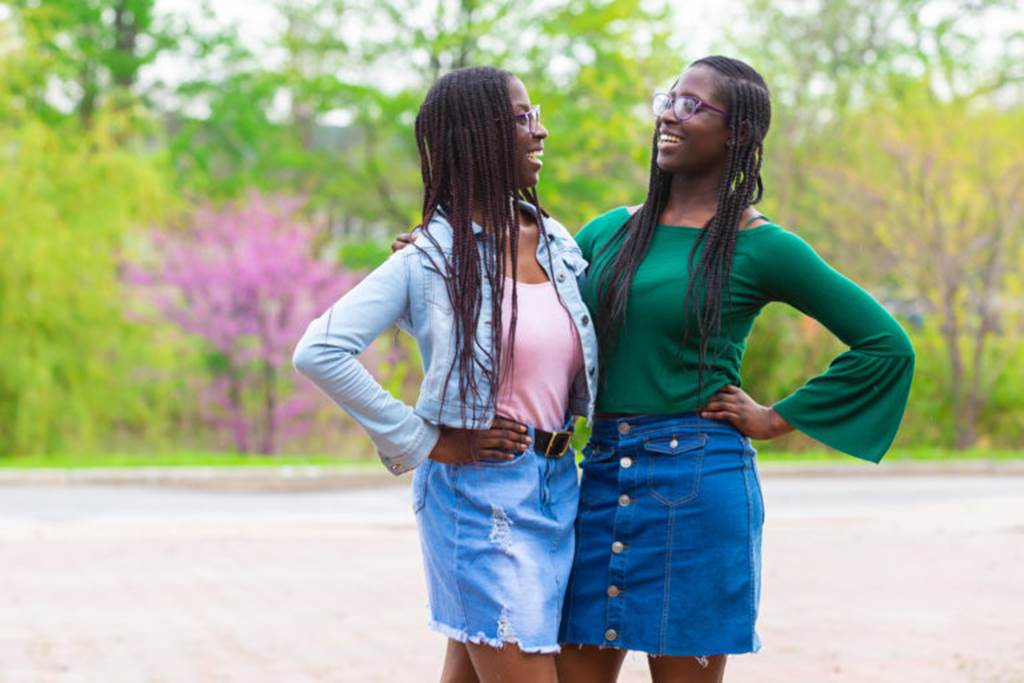 Nannette and Naomi Beckley face each other