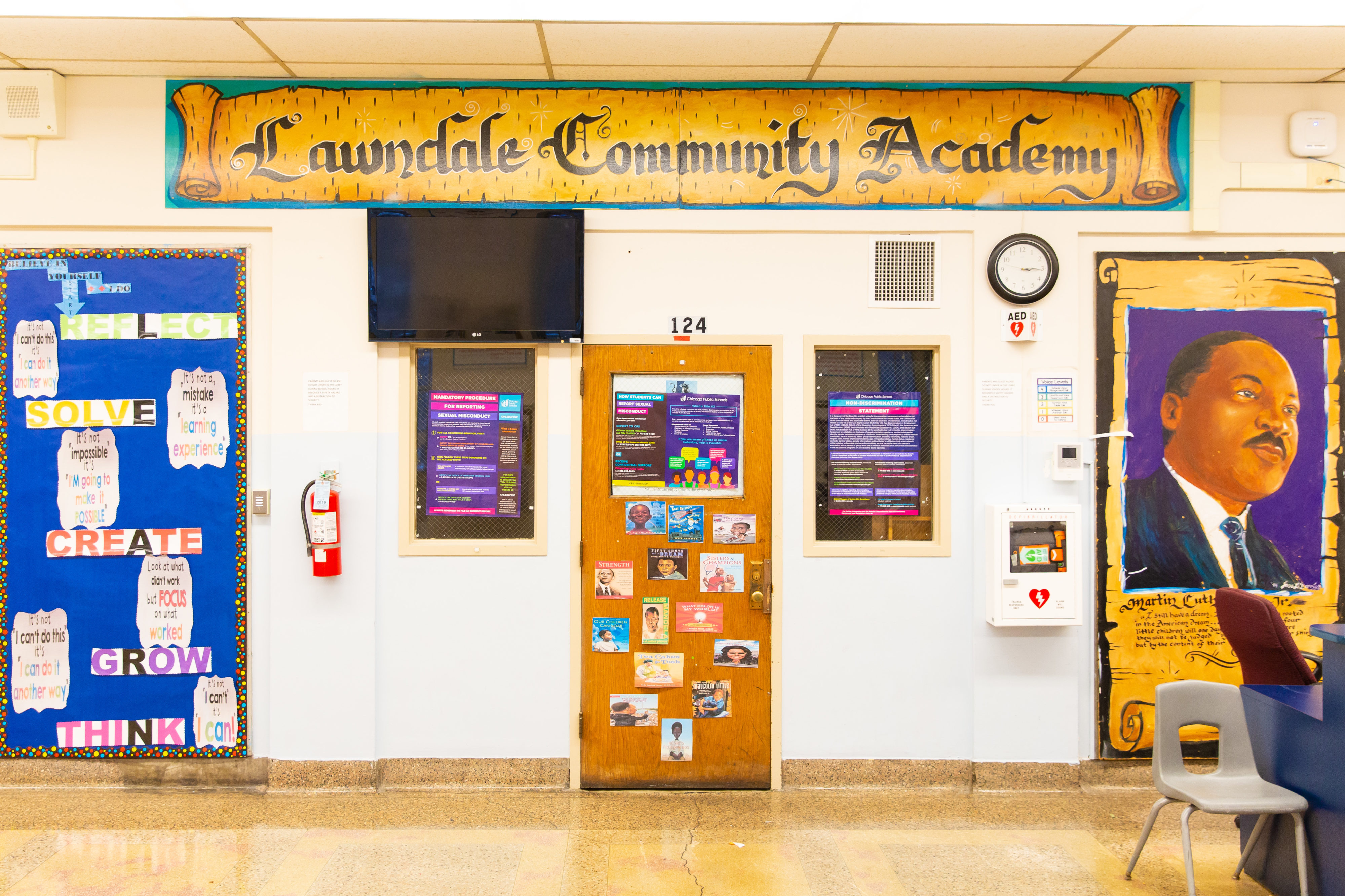 A classroom door with pictures on it