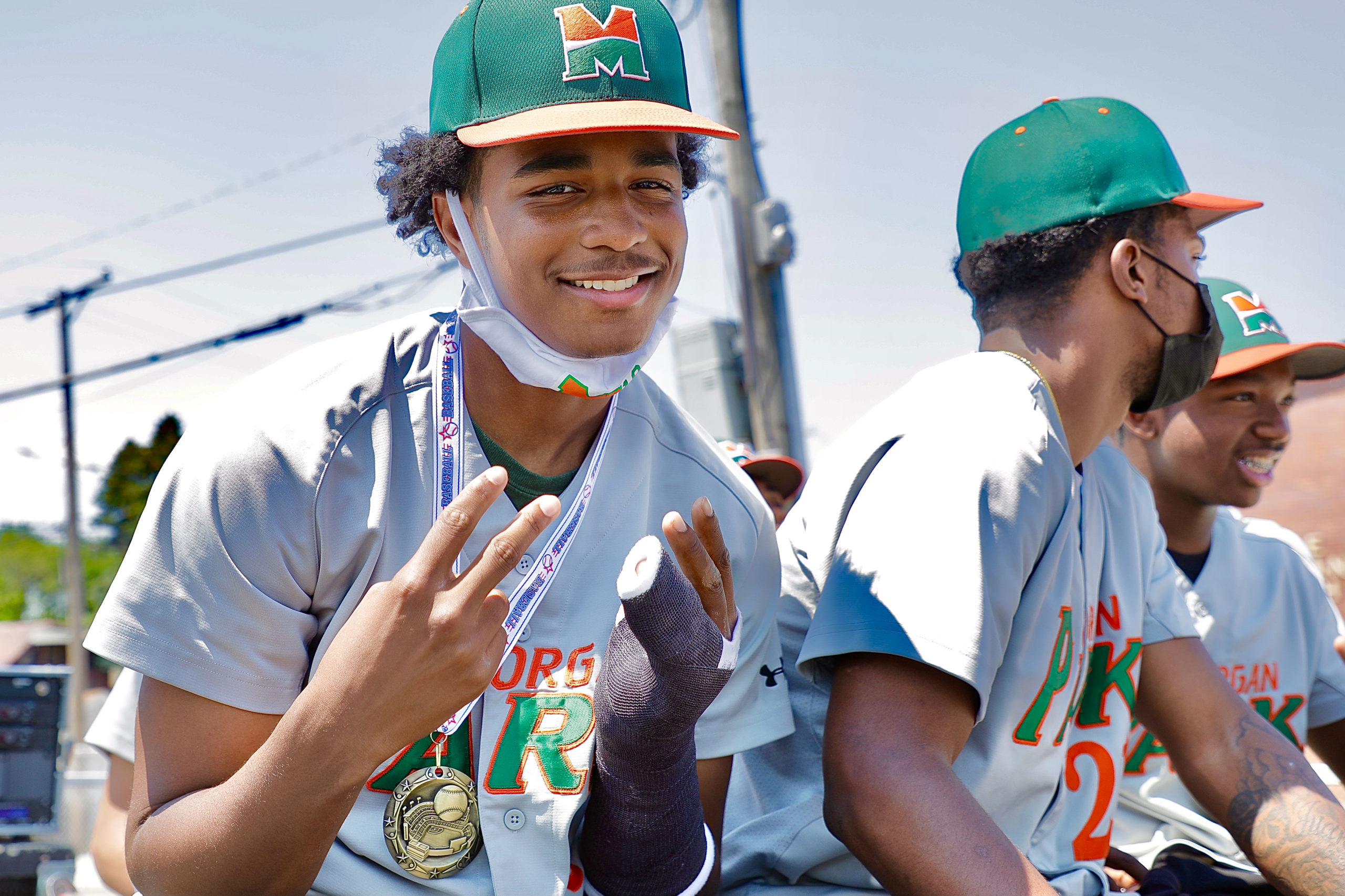 A baseball player smiling