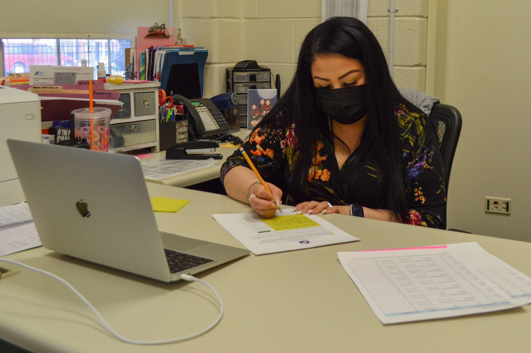 Ms. Michelle Soto working at her desk