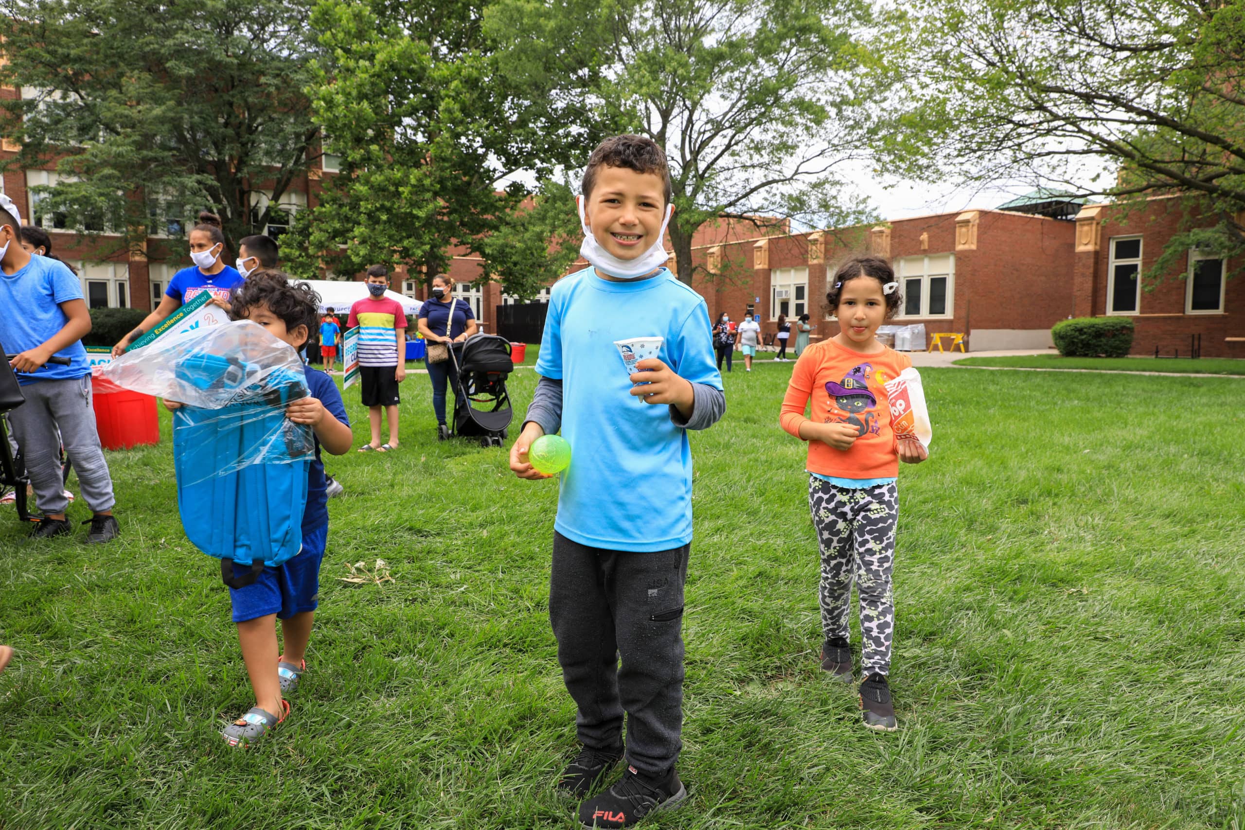Student holding a snow cone