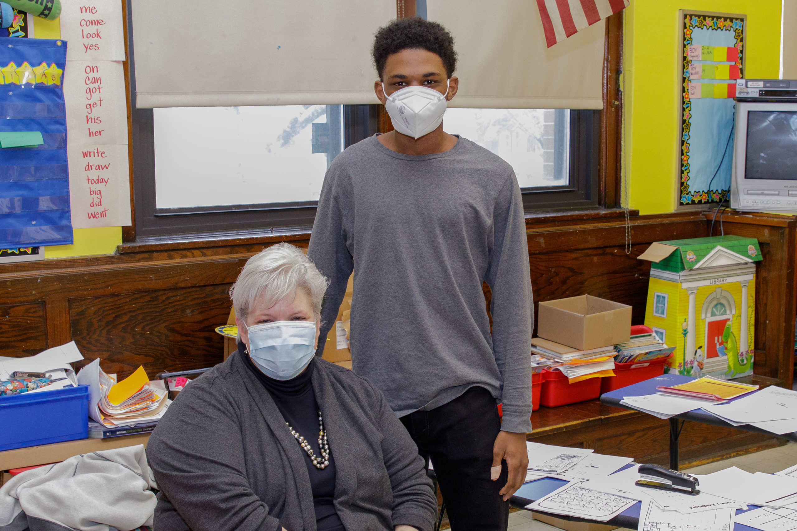 Ms. Hall sitting next to Marcus