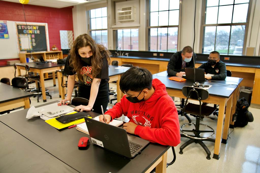 A student working on his laptop