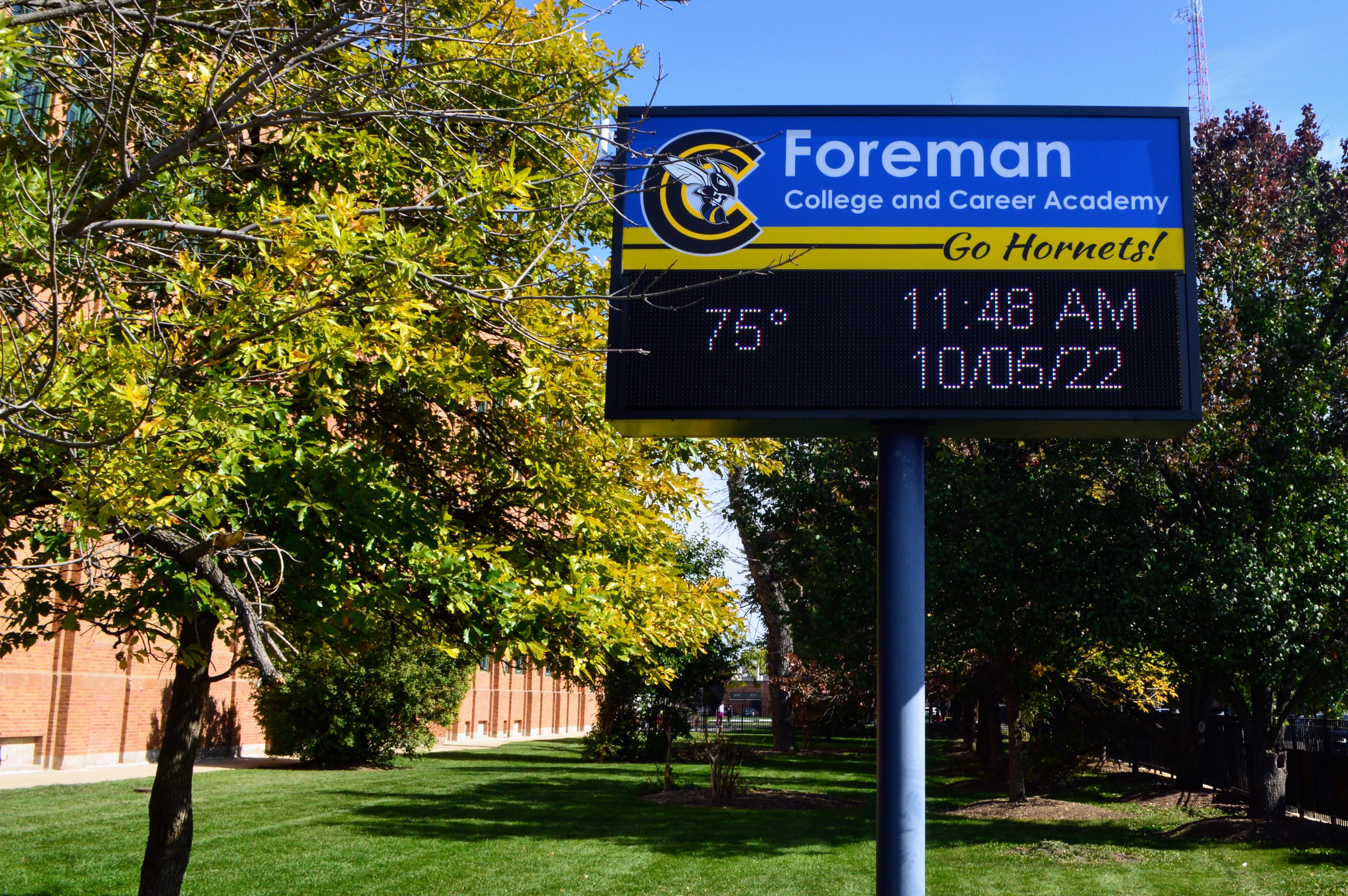Foreman College and Career Academy sign displaying date and time