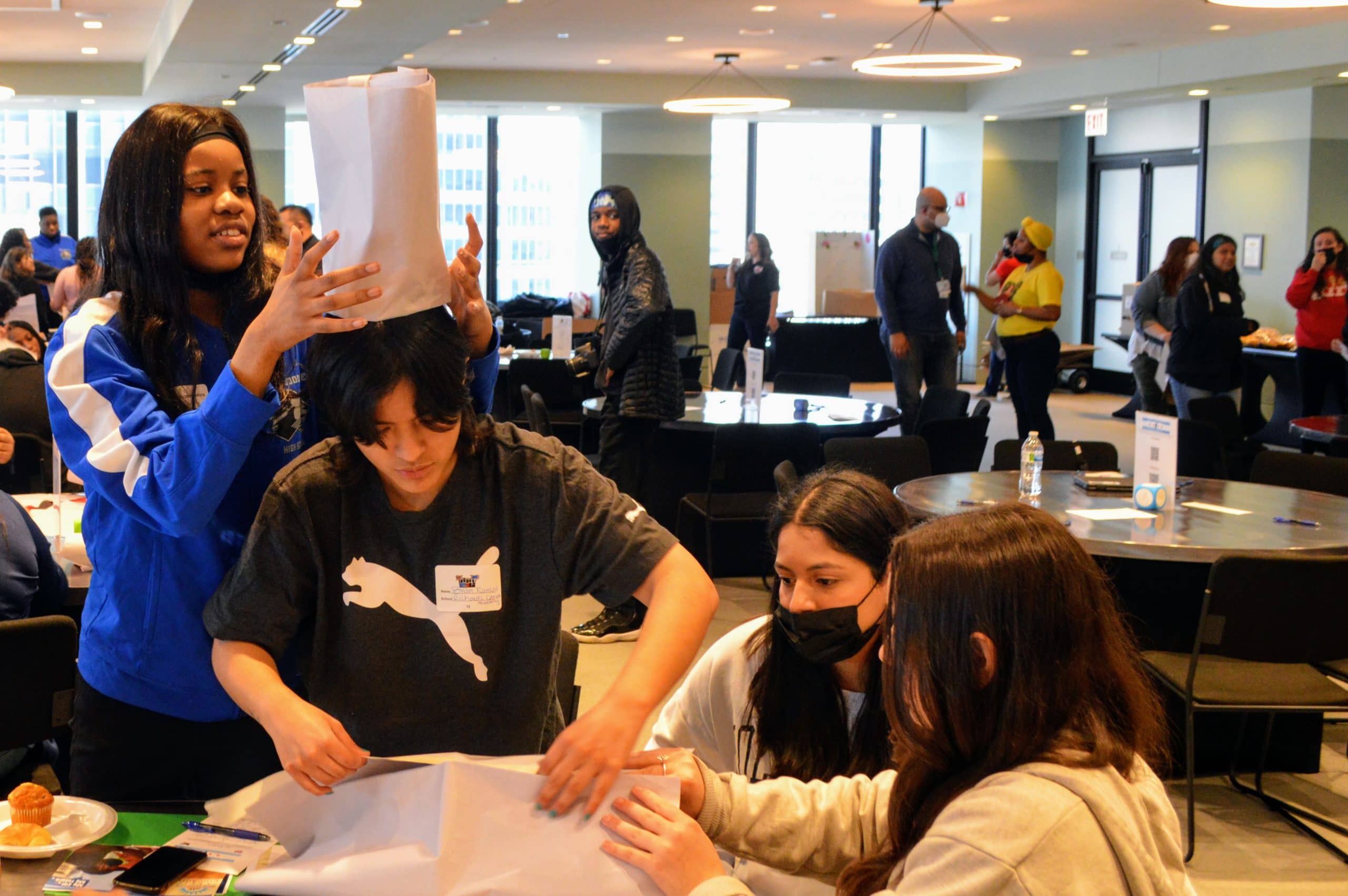Students bonded through a “tallest hat” competition led by Embarc Chicago