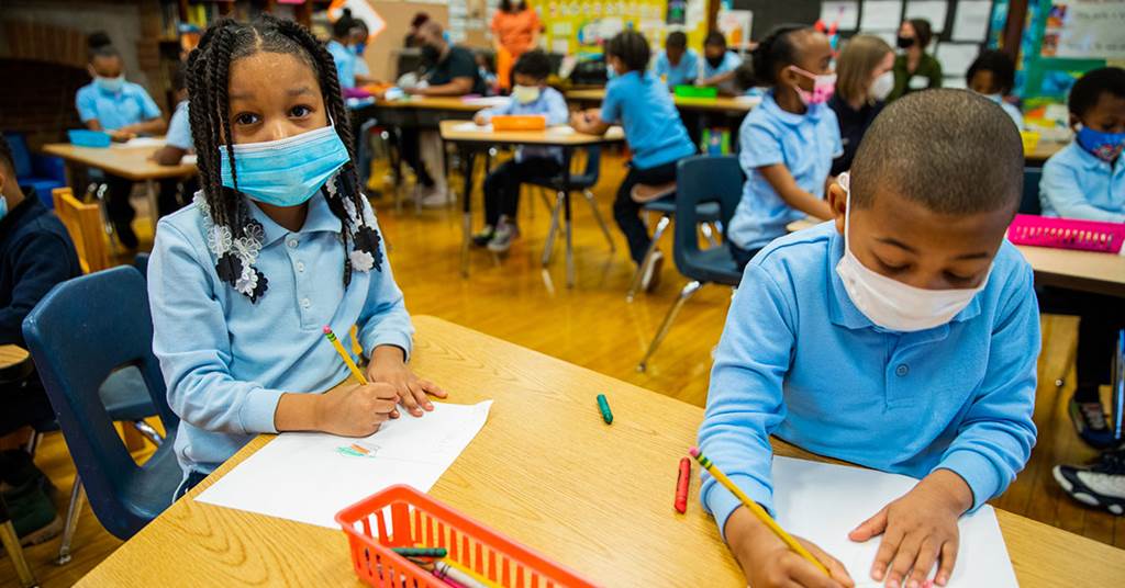 Two young students drawing