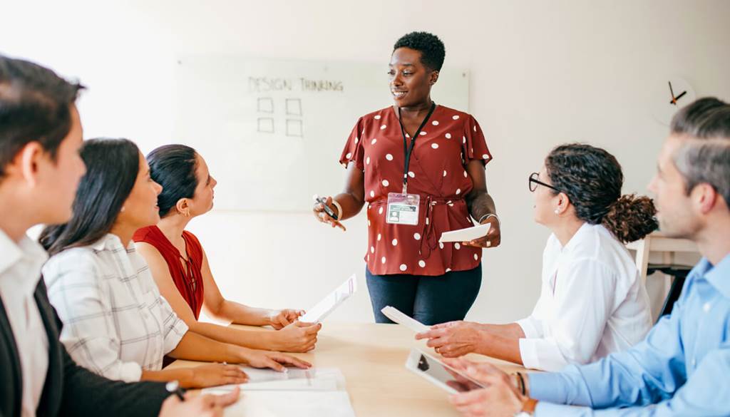 Woman conducting a office meeting